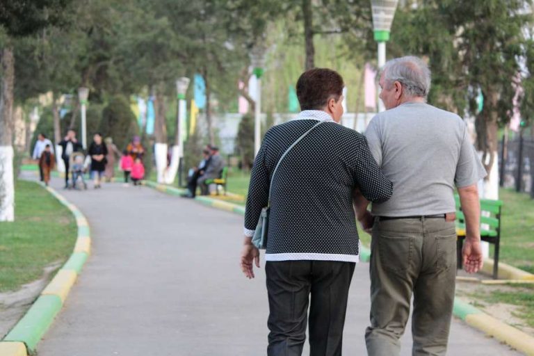 two mens holding hands