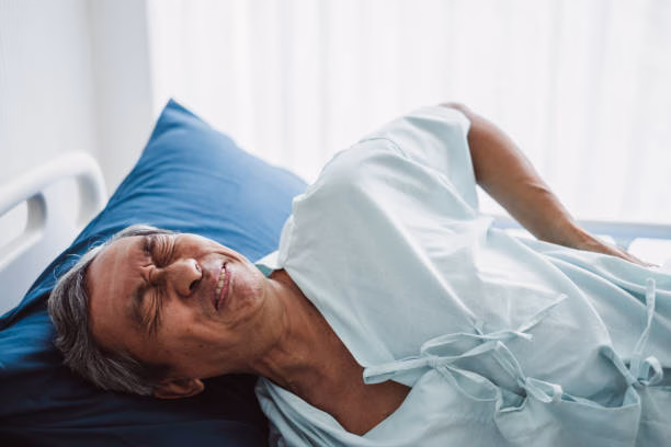 Old senior asian patient suffering from back pain, back ache